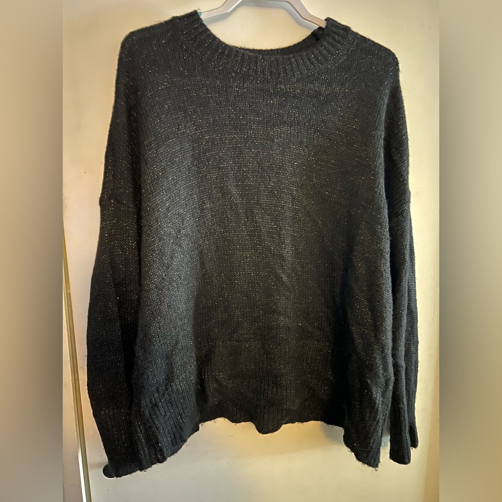 Black with Gold Accents in this Lightweight Turtleneck Sweater